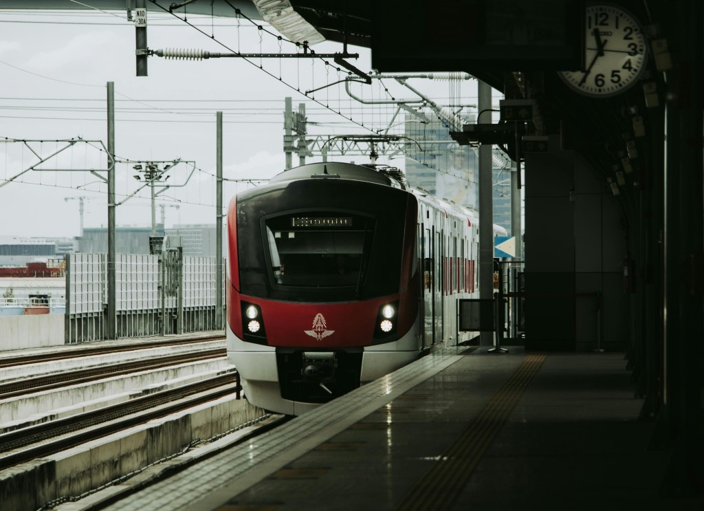 A train pulls into a station.